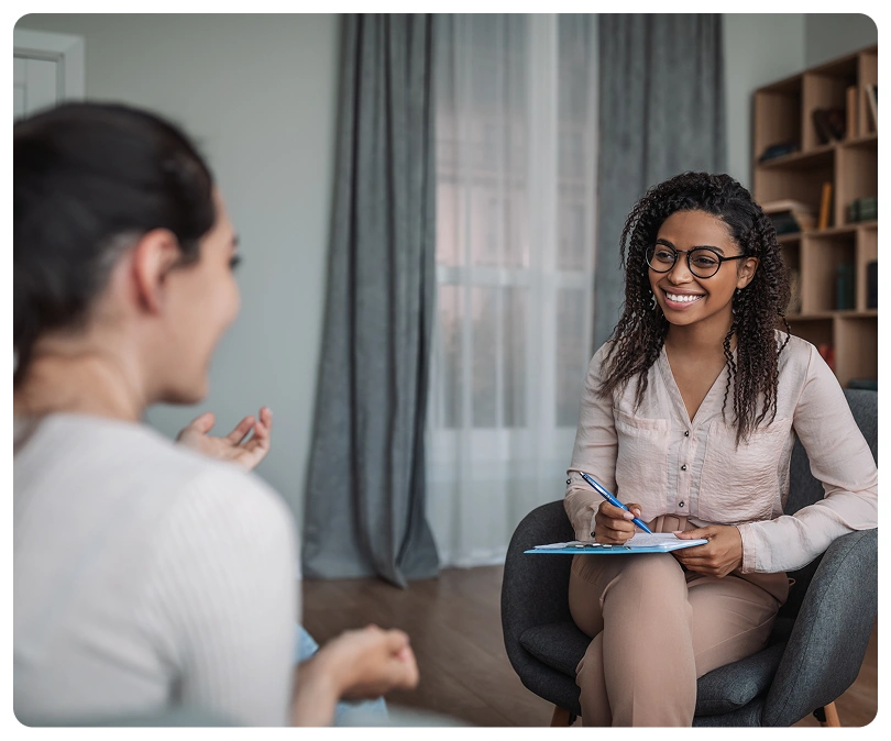 Therapist listening to a client