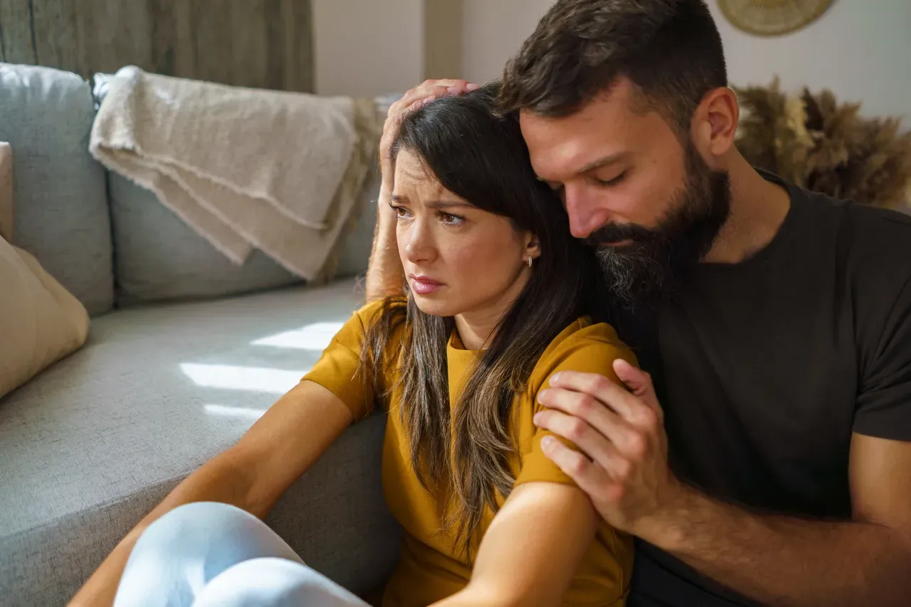 Comforting embrace on a couch